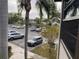 View of a pond and parking lot from condo window at 3750 59Th W Ave # 4096, Bradenton, FL 34210