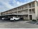 Two-story condo building with covered parking and ample space at 3983 Maceachen Blvd # 432, Sarasota, FL 34233