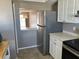 Kitchen with stainless steel appliances and white cabinets at 3983 Maceachen Blvd # 432, Sarasota, FL 34233