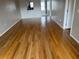 Bright living room featuring wood flooring at 3983 Maceachen Blvd # 432, Sarasota, FL 34233
