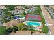 Community overview, including pool, tennis courts, and clubhouse at 4275 Castlebridge Ln # 1312B1, Sarasota, FL 34238