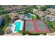 Aerial view of community amenities, including pool and tennis courts at 4275 Castlebridge Ln # 1312B1, Sarasota, FL 34238