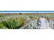 Sand path and boardwalk leading to the beach at 4275 Castlebridge Ln # 1312B1, Sarasota, FL 34238
