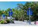 Siesta Beach entrance with signage and bike racks at 4275 Castlebridge Ln # 1312B1, Sarasota, FL 34238