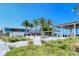 Siesta Beach pavilion with landscaping and seating at 4275 Castlebridge Ln # 1312B1, Sarasota, FL 34238