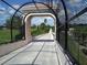 Scenic bike path under a covered bridge at 4275 Castlebridge Ln # 1312B1, Sarasota, FL 34238