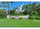 Pinestone at Falcon Ranch community entrance sign, showcasing attractive landscaping at 4275 Castlebridge Ln # 1312B1, Sarasota, FL 34238