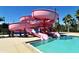 Pink double water slides and refreshing pool at 4275 Castlebridge Ln # 1312B1, Sarasota, FL 34238