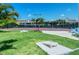 Community cornhole and tennis courts at 4275 Castlebridge Ln # 1312B1, Sarasota, FL 34238