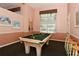 Relaxing game room featuring a pool table and comfortable seating at 4275 Castlebridge Ln # 1312B1, Sarasota, FL 34238