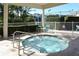 Community hot tub with easy access and seating at 4275 Castlebridge Ln # 1312B1, Sarasota, FL 34238