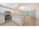 Modern kitchen with stainless steel appliances and white cabinets at 4275 Castlebridge Ln # 1312B1, Sarasota, FL 34238