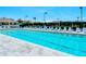 Inviting community pool with multiple lounge chairs at 4275 Castlebridge Ln # 1312B1, Sarasota, FL 34238