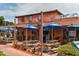 The Hub Baja Grill, featuring outdoor seating and umbrellas at 4275 Castlebridge Ln # 1312B1, Sarasota, FL 34238
