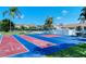 Outdoor shuffleboard, basketball, and tennis courts at 4275 Castlebridge Ln # 1312B1, Sarasota, FL 34238