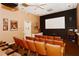 Community theater room with comfortable seating at 4275 Castlebridge Ln # 1312B1, Sarasota, FL 34238