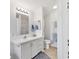 Clean bathroom with walk-in shower, vanity, and updated fixtures at 4316 12Th Street E Ct, Ellenton, FL 34222