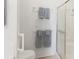 Clean bathroom with shower and tub, updated fixtures and grab bars at 4316 12Th Street E Ct, Ellenton, FL 34222