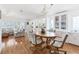 Dining area with wood table and chairs, built-in hutch and hardwood floors at 4316 12Th Street E Ct, Ellenton, FL 34222