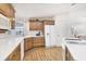 Bright kitchen with wood cabinets, ample counter space, and modern appliances at 4316 12Th Street E Ct, Ellenton, FL 34222