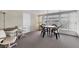 Sunroom with table and chairs, perfect for relaxing and enjoying the view at 4316 12Th Street E Ct, Ellenton, FL 34222