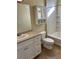 Bathroom with white vanity, medicine cabinet, and bathtub at 4802 51St W St # 708, Bradenton, FL 34210
