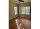 Bright bedroom with wood-look flooring and ceiling fan at 4802 51St W St # 708, Bradenton, FL 34210