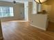 Open living area with laminate flooring and kitchen views at 4802 51St W St # 708, Bradenton, FL 34210