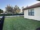 House with fenced backyard, lush lawn, and privacy at 4802 68Th Street E Cir, Bradenton, FL 34203