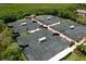 Aerial view of multiple tennis courts at 4892 Peregrine E Pt, Sarasota, FL 34231