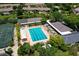 Community pool and tennis courts at 4892 Peregrine E Pt, Sarasota, FL 34231