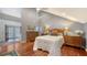 Main bedroom with hardwood floors and access to backyard at 4892 Peregrine E Pt, Sarasota, FL 34231