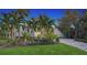 Attractive home with lush landscaping and a paved driveway at 4892 Peregrine E Pt, Sarasota, FL 34231