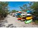 Community kayak storage with many kayaks available for resident use at 4892 Peregrine E Pt, Sarasota, FL 34231