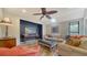 Comfortable living room featuring a sectional sofa and hardwood floors at 4892 Peregrine E Pt, Sarasota, FL 34231
