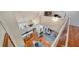 Open loft area overlooking the living and dining areas at 4892 Peregrine E Pt, Sarasota, FL 34231