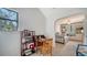Home office with built-in desk and view into bedroom at 4892 Peregrine E Pt, Sarasota, FL 34231