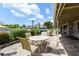 Enjoy outdoor dining on this community patio with seating at 4892 Peregrine E Pt, Sarasota, FL 34231
