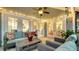 Spacious covered patio with comfortable seating and access to backyard at 4892 Peregrine E Pt, Sarasota, FL 34231