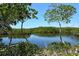 Stunning view of serene waterway, lush mangroves, and tranquil waters at 4892 Peregrine E Pt, Sarasota, FL 34231
