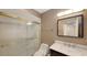 Bathroom with shower/tub combo, vanity, and mirror at 5152 Marsh Field Ln # 117, Sarasota, FL 34235