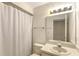 Simple bathroom with shower, toilet and vanity at 5152 Marsh Field Ln # 117, Sarasota, FL 34235