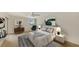 Spacious bedroom with modern decor and ample natural light at 5152 Marsh Field Ln # 117, Sarasota, FL 34235