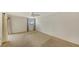 Bright bedroom with carpet flooring and sliding glass door at 5152 Marsh Field Ln # 117, Sarasota, FL 34235
