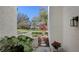 Landscaped entryway with stone path leading to the front door at 5152 Marsh Field Ln # 117, Sarasota, FL 34235