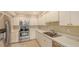 Modern kitchen featuring stainless steel appliances at 5152 Marsh Field Ln # 117, Sarasota, FL 34235