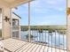 Screened balcony with scenic water views at 5440 Eagles Point Cir # 405, Sarasota, FL 34231