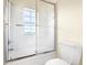Bathroom with shower/tub combo and a window at 5440 Eagles Point Cir # 405, Sarasota, FL 34231