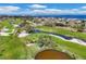 Aerial view of lush golf course community at 545 Sanctuary Dr # A803, Longboat Key, FL 34228