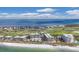 Aerial view of luxury beachfront condos with ocean and golf course views at 545 Sanctuary Dr # A803, Longboat Key, FL 34228